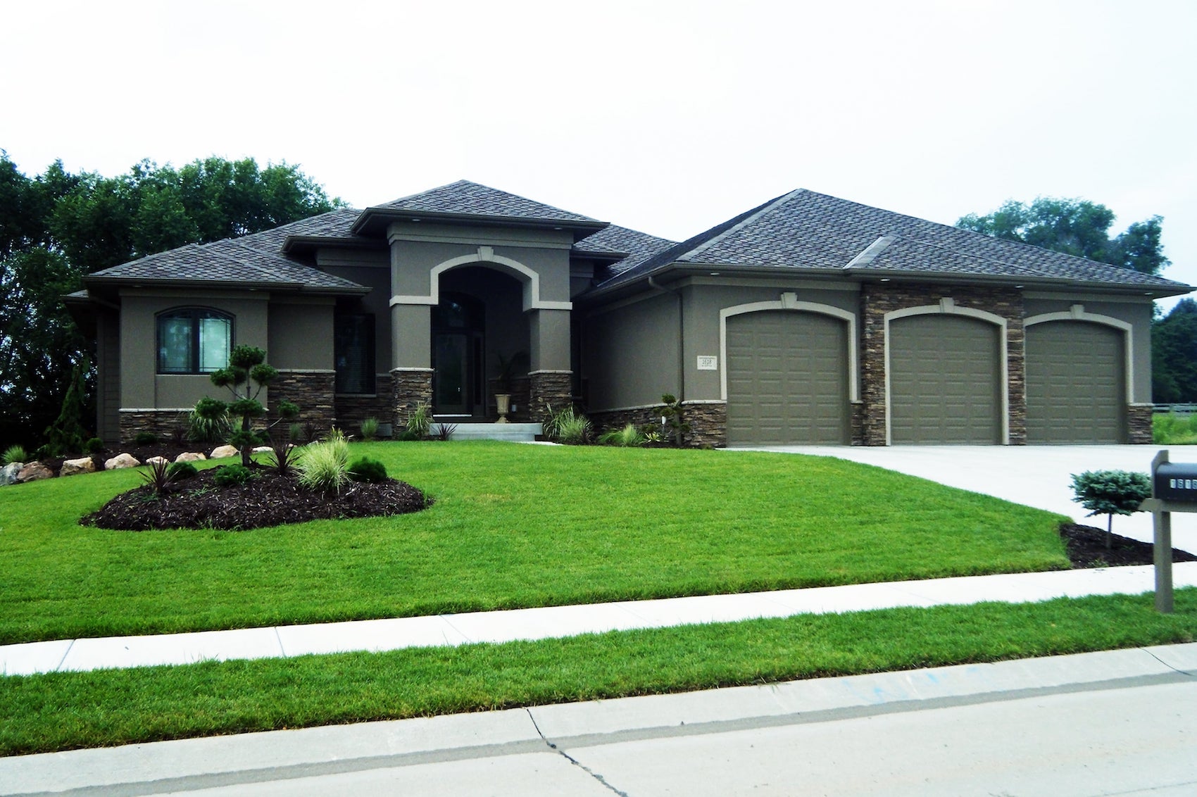 Color photograph of Mediterranean home plan (ThePlanCollection: House Plan #100-1112)