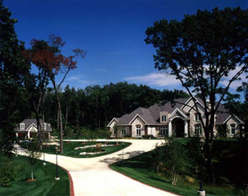 EXTERIOR PHOTO of this 4-Bedroom,6571 Sq Ft Plan -6571