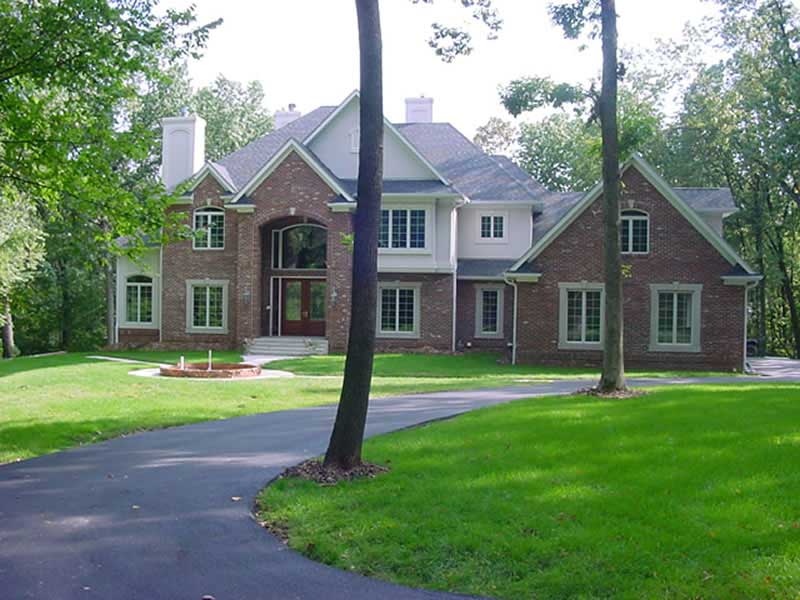 Front elevation of Luxury home (ThePlanCollection: House Plan #101-1126)