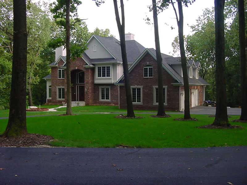 EXTERIOR PHOTO of this 4-Bedroom,5185 Sq Ft Plan -5185