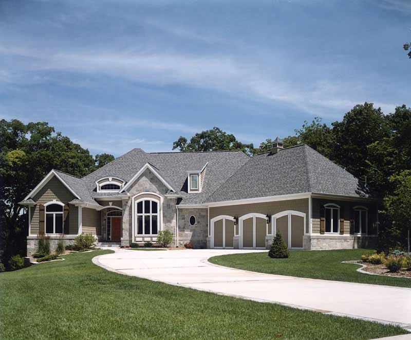 Front elevation of European home (ThePlanCollection: House Plan #101-1136)