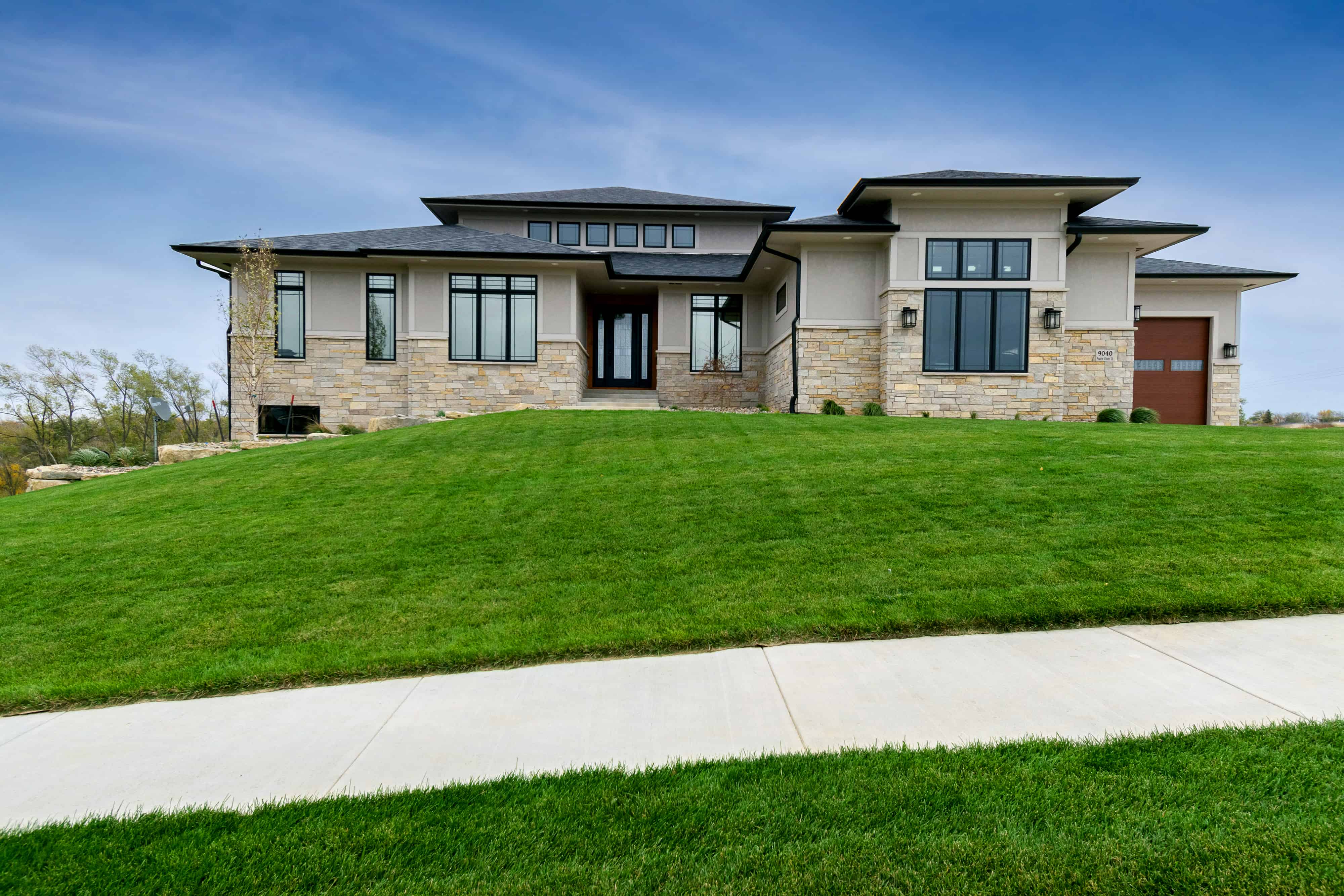 Front elevation of Contemporary home (ThePlanCollection: House Plan #101-2003)