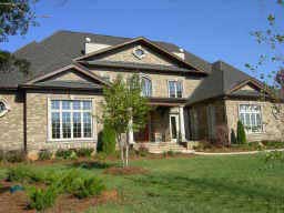 Home Exterior Photograph of this 4-Bedroom,5493 Sq Ft Plan -5493