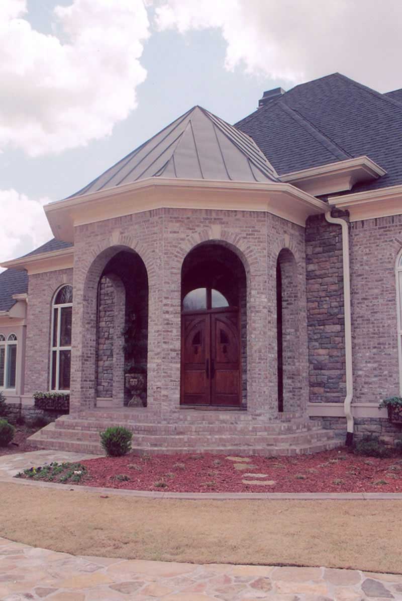 EXTERIOR PHOTO of this 4-Bedroom,5082 Sq Ft Plan -5082