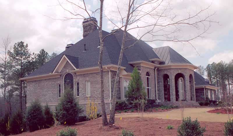 EXTERIOR PHOTO of this 4-Bedroom,5082 Sq Ft Plan -5082