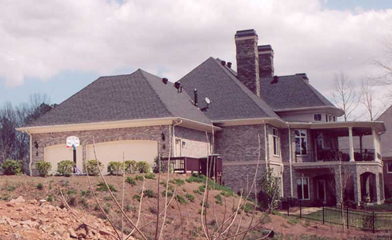 EXTERIOR PHOTO of this 4-Bedroom,5082 Sq Ft Plan -5082