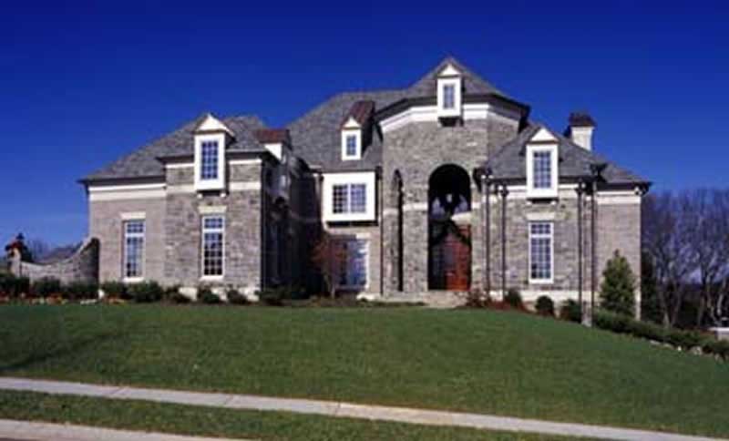 Front View of this 4-Bedroom,4041 Sq Ft Plan -106-1167