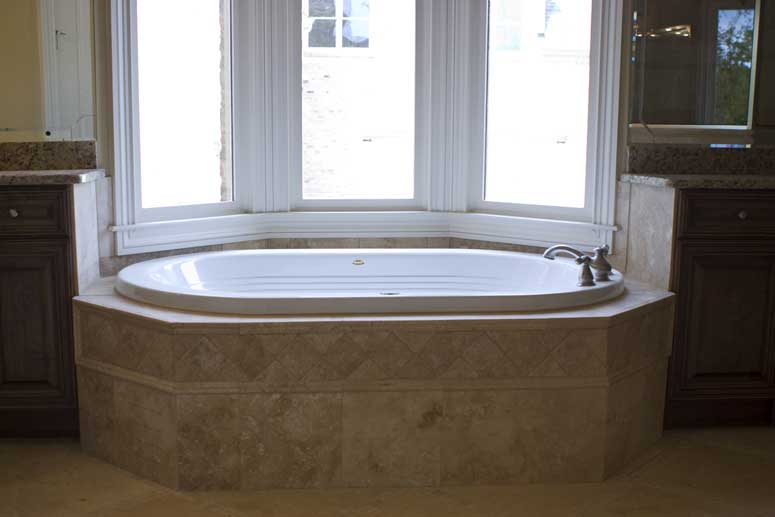 Master Bathroom: Tub of this 4-Bedroom,4041 Sq Ft Plan -106-1167