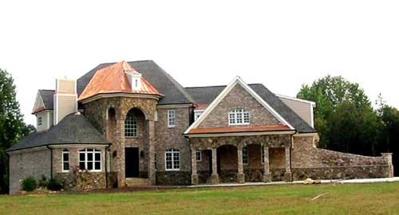 EXTERIOR PHOTO of this 4-Bedroom,3912 Sq Ft Plan -3912