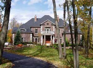 Home Plan Front Elevation of this 5-Bedroom,5083 Sq Ft Plan -106-1190