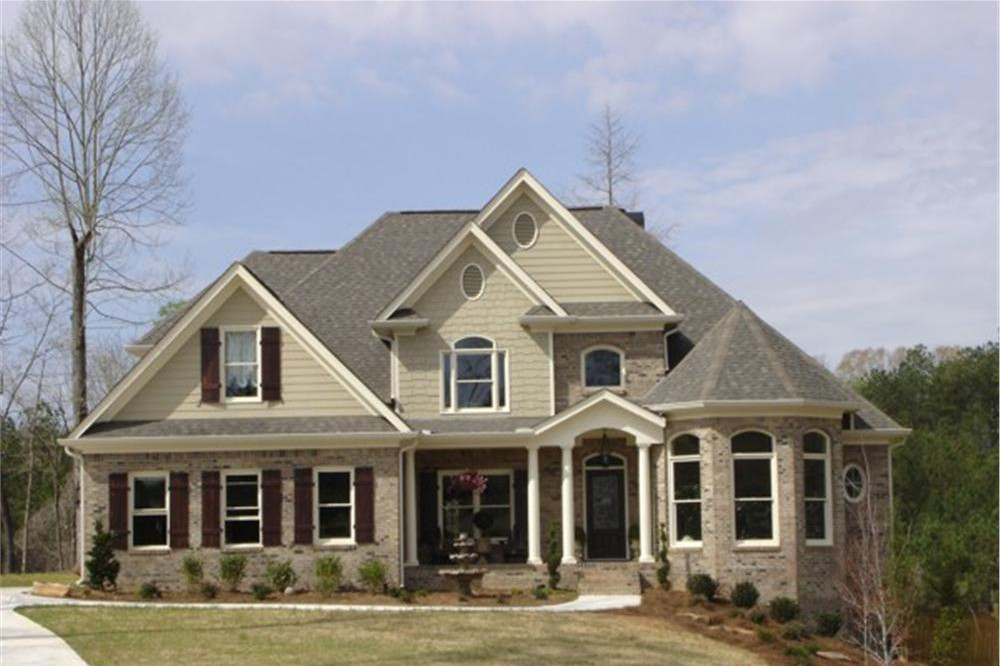 Color photograph of Country home plan (ThePlanCollection: House Plan #109-1179)