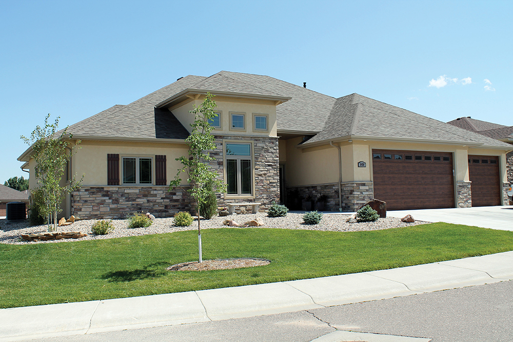Front elevation of Tuscan home (ThePlanCollection: House Plan #120-2454)