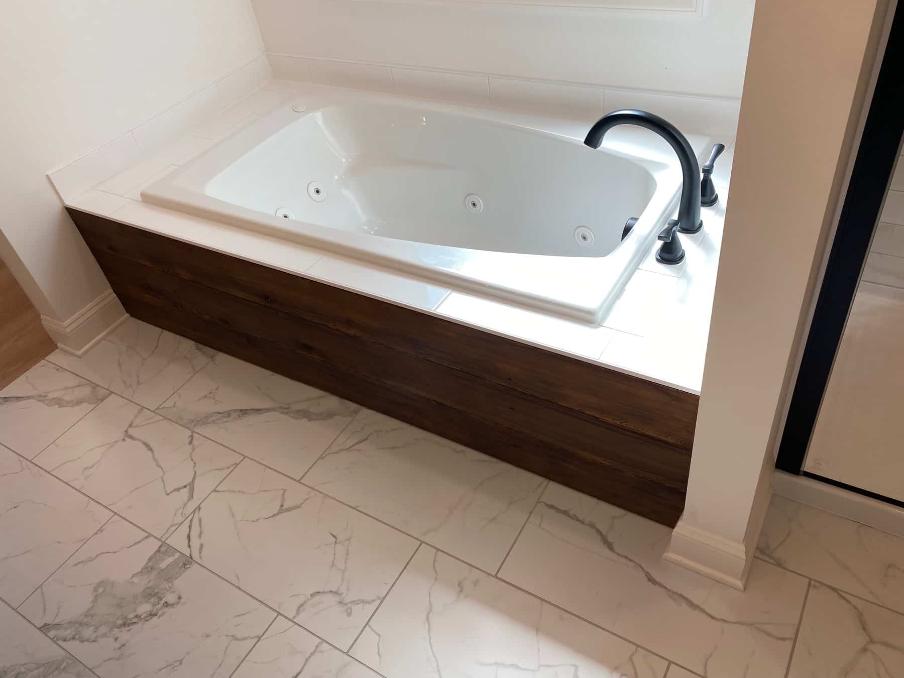 Master Bathroom: Tub of this 3-Bedroom,1452 Sq Ft Plan -120-2552