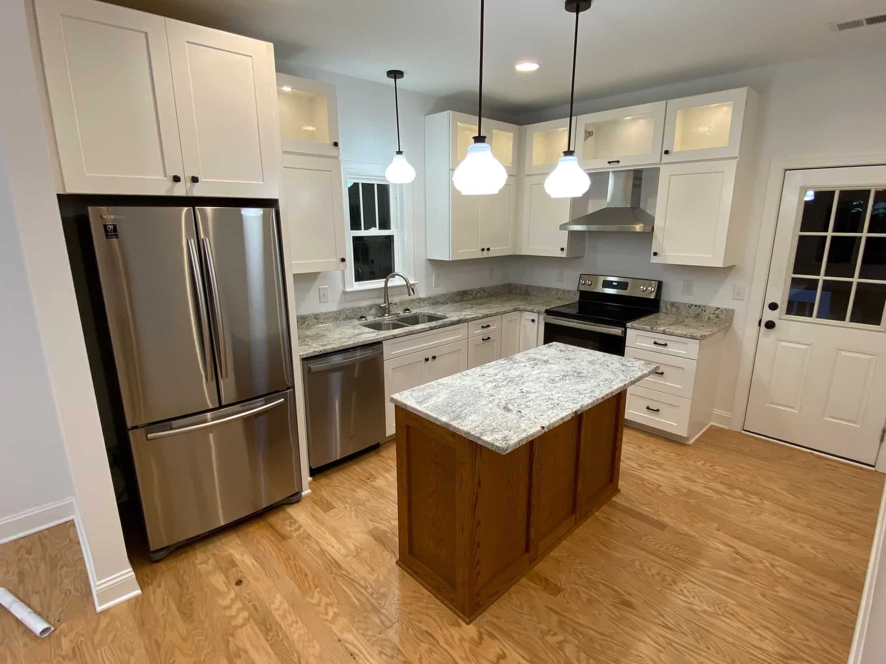 Kitchen: Kitchen Island of this 3-Bedroom,1195 Sq Ft Plan -120-2654