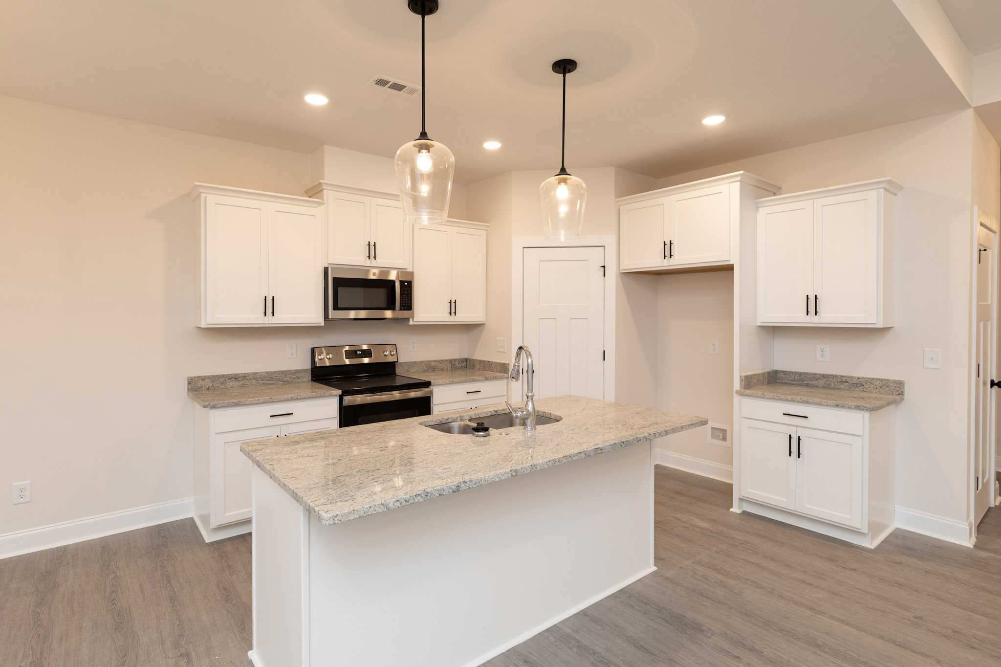 Kitchen: Kitchen Island of this 4-Bedroom,2437 Sq Ft Plan -120-2720