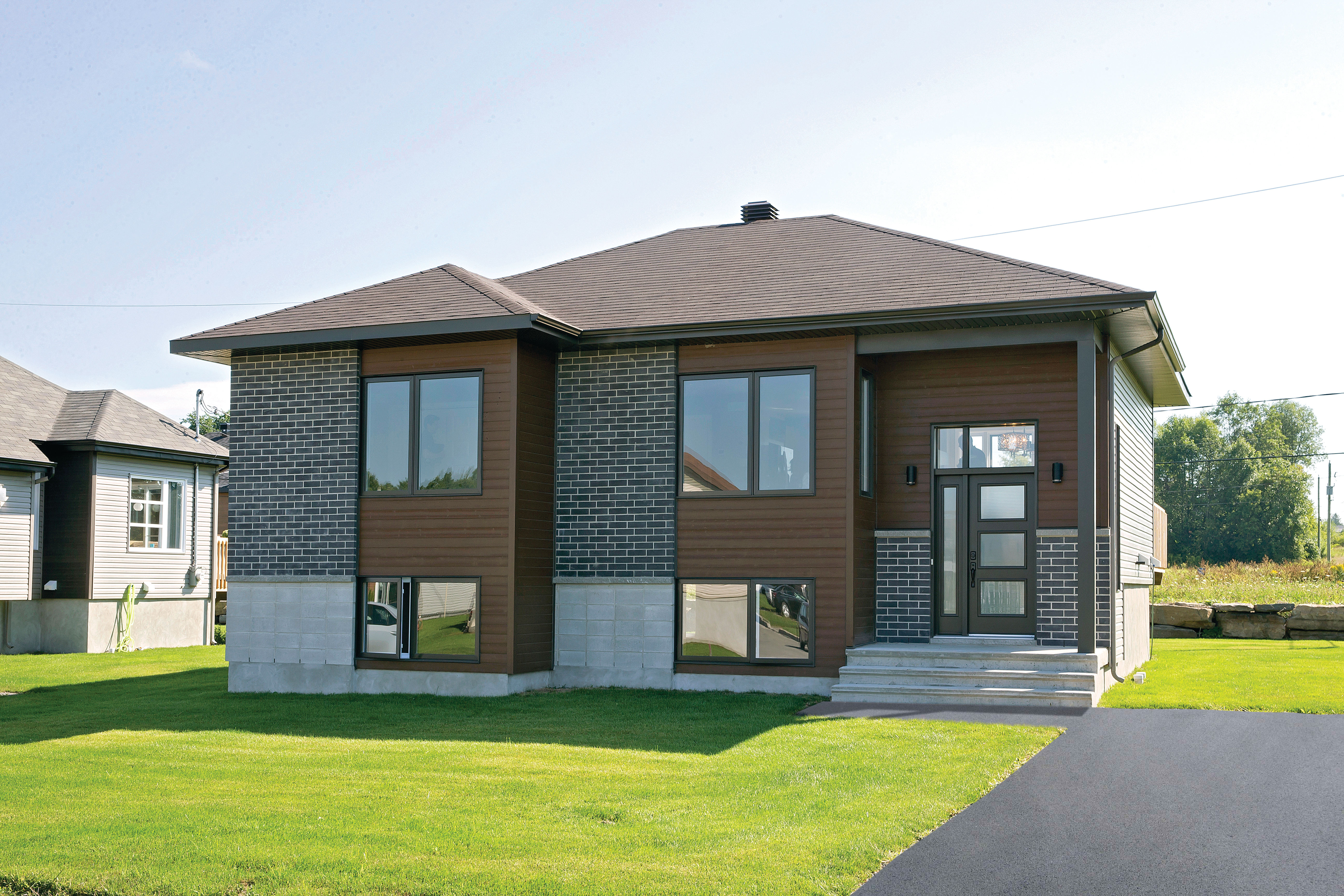 This is the front elevation for these split-level Home Plans.