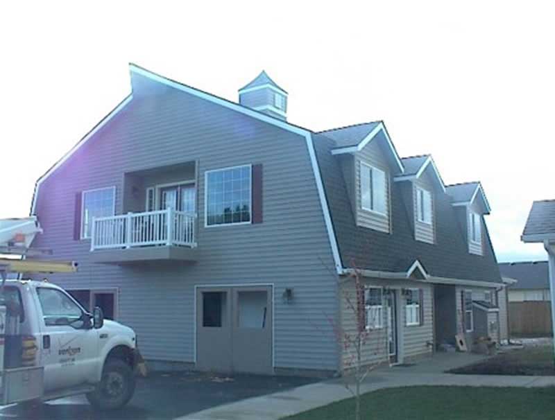 Front Elevation of this Barn Style House (#132-1354) at The Plan Collection.