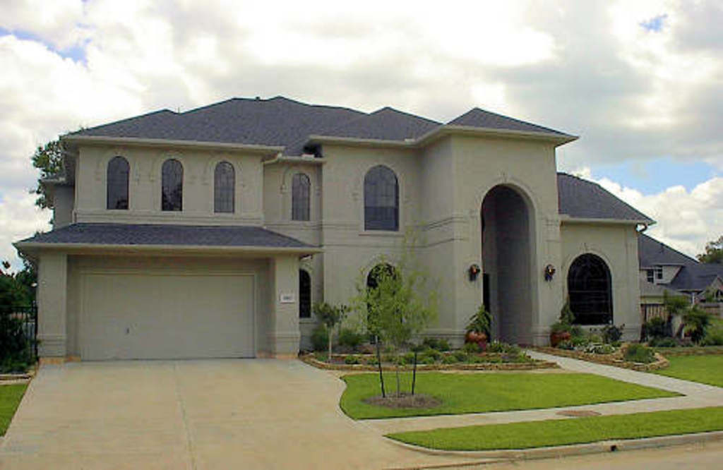 Front elevation of Mediterranean home (ThePlanCollection: House Plan #134-1191)