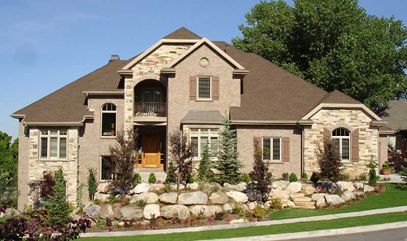 This is a color photo of a luxury traditional house.