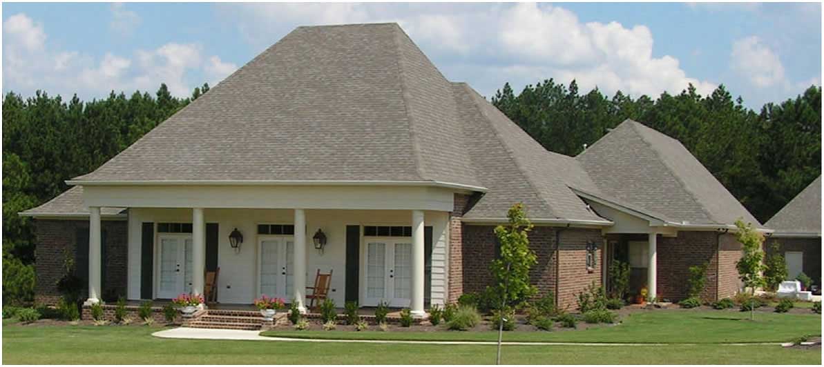 This is a color photo of these Country Homeplans.