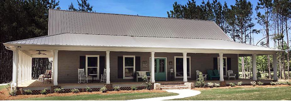 Front elevation of Texas Style home (ThePlanCollection: House Plan #140-1132)