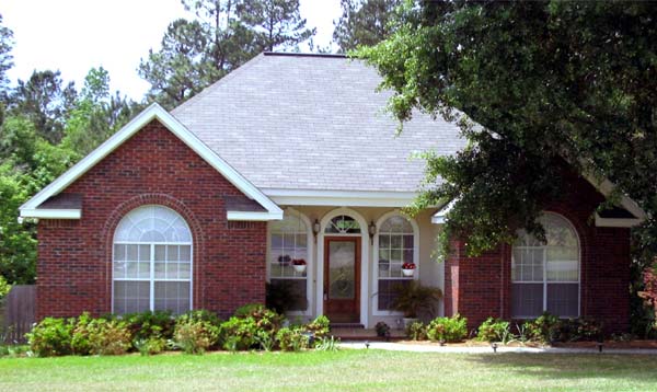 Front elevation of Ranch home (ThePlanCollection: House Plan #141-1133)