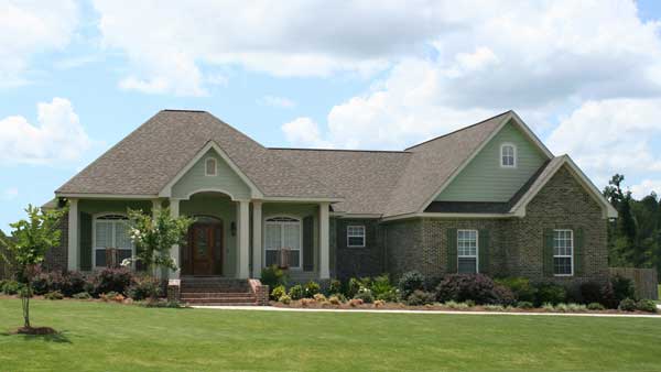This is a color photo of these French Country House Plans.