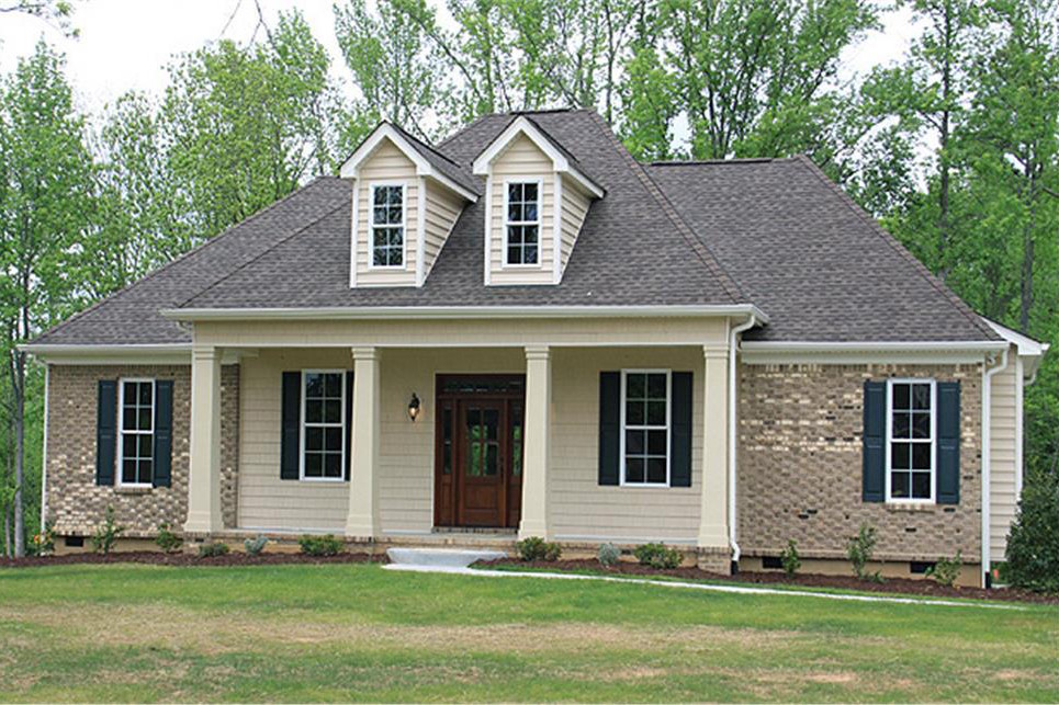 Color photograph of Country home plan (ThePlanCollection: House Plan #141-1259)