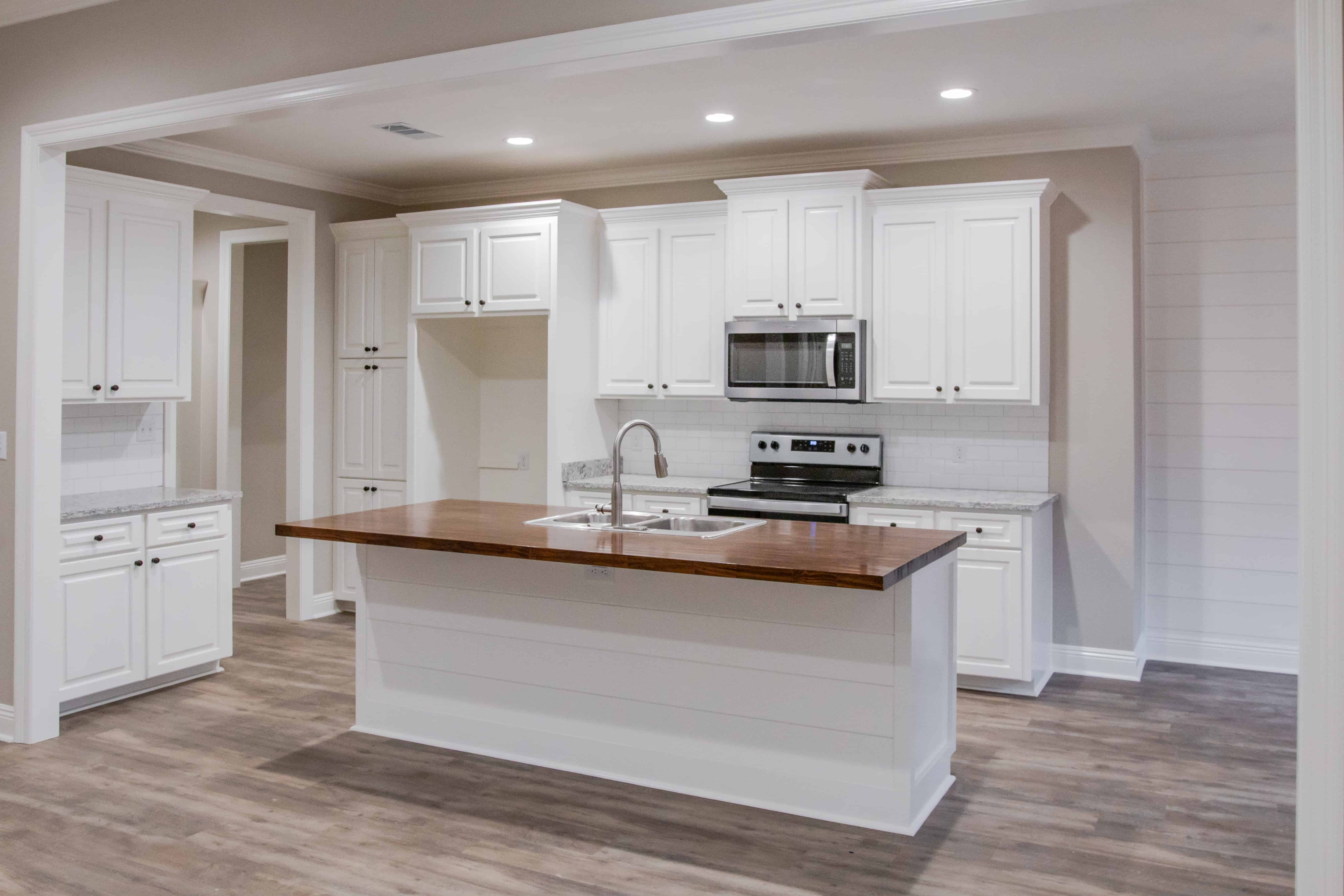Kitchen: Kitchen Island of this 3-Bedroom,1778 Sq Ft Plan -142-1076