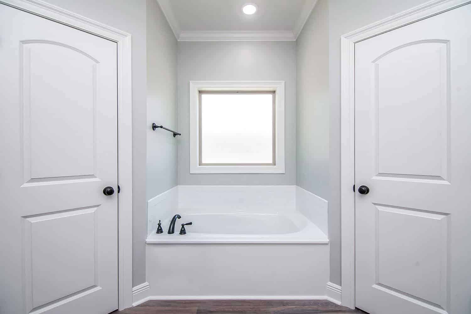 Bathroom of this 4-Bedroom, 1798 Sq Ft Plan - 142-1078