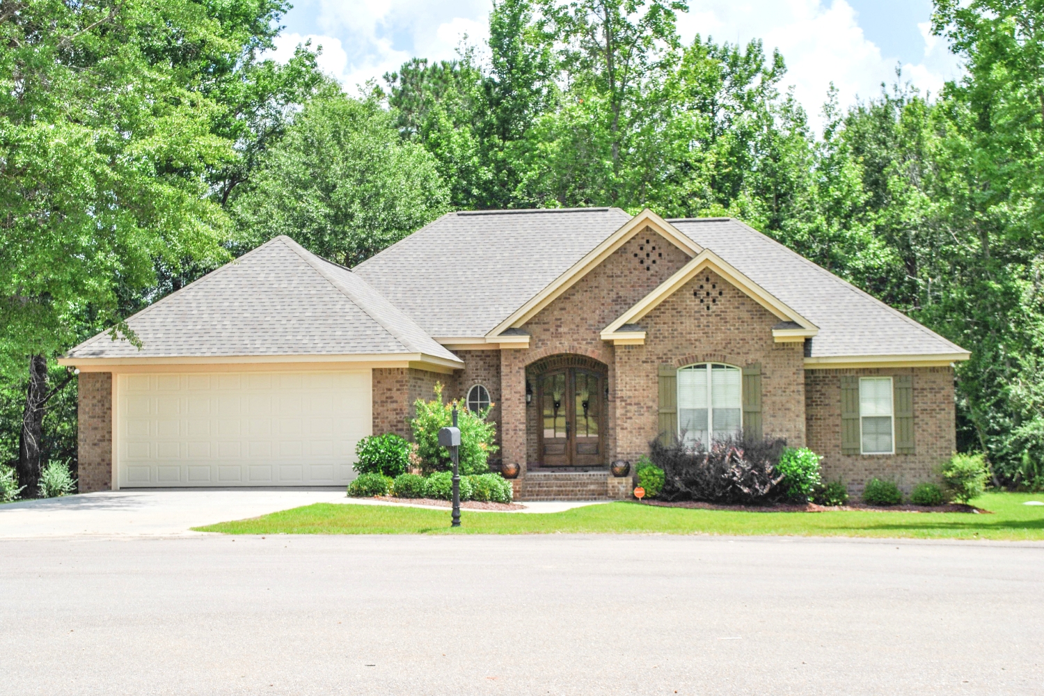 Front Elevation Photo of this Traditional House (#142-1087) at The Plan Collection.