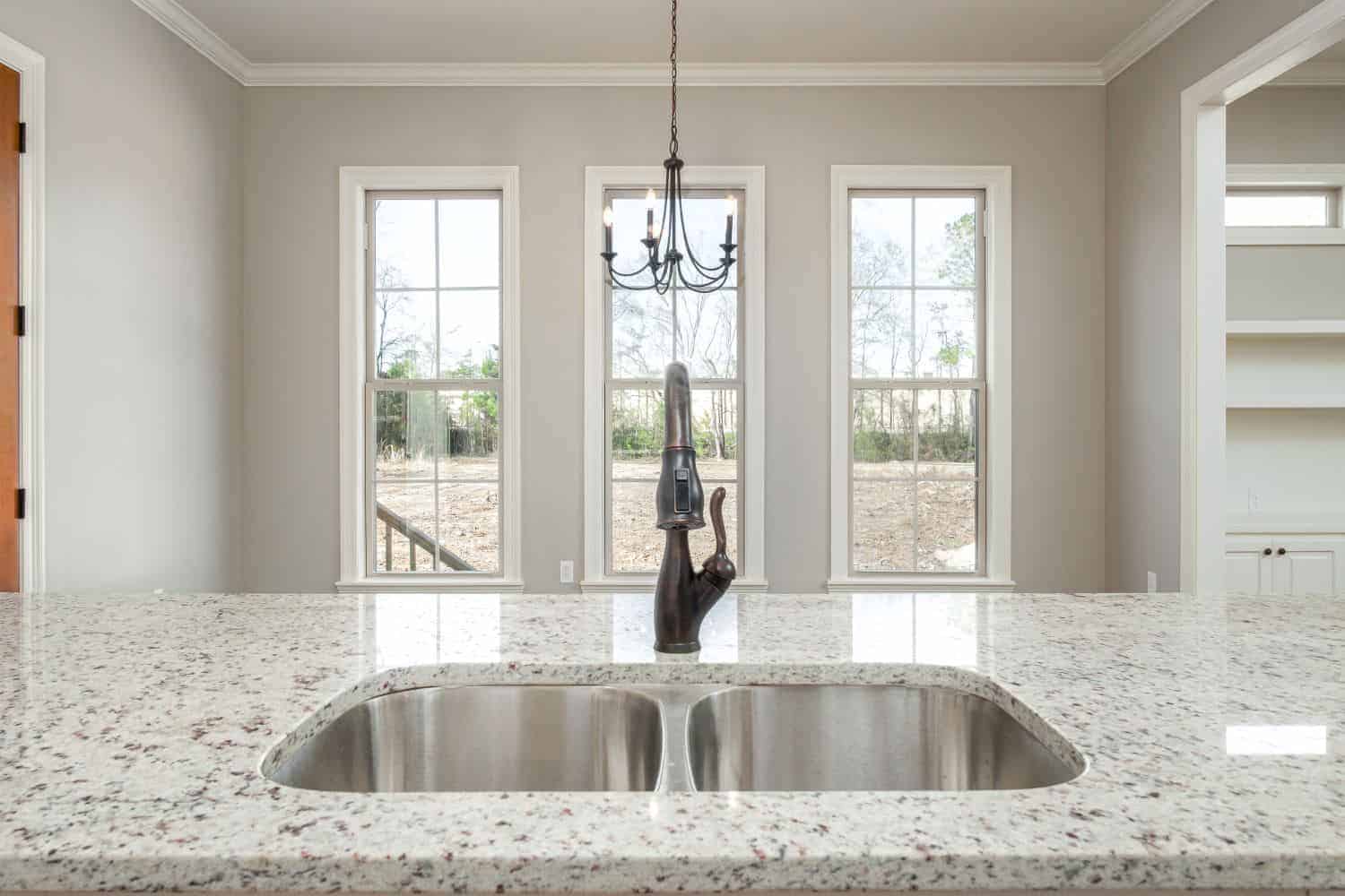 Kitchen: Kitchen Island of this 3-Bedroom,1450 Sq Ft Plan -142-1123