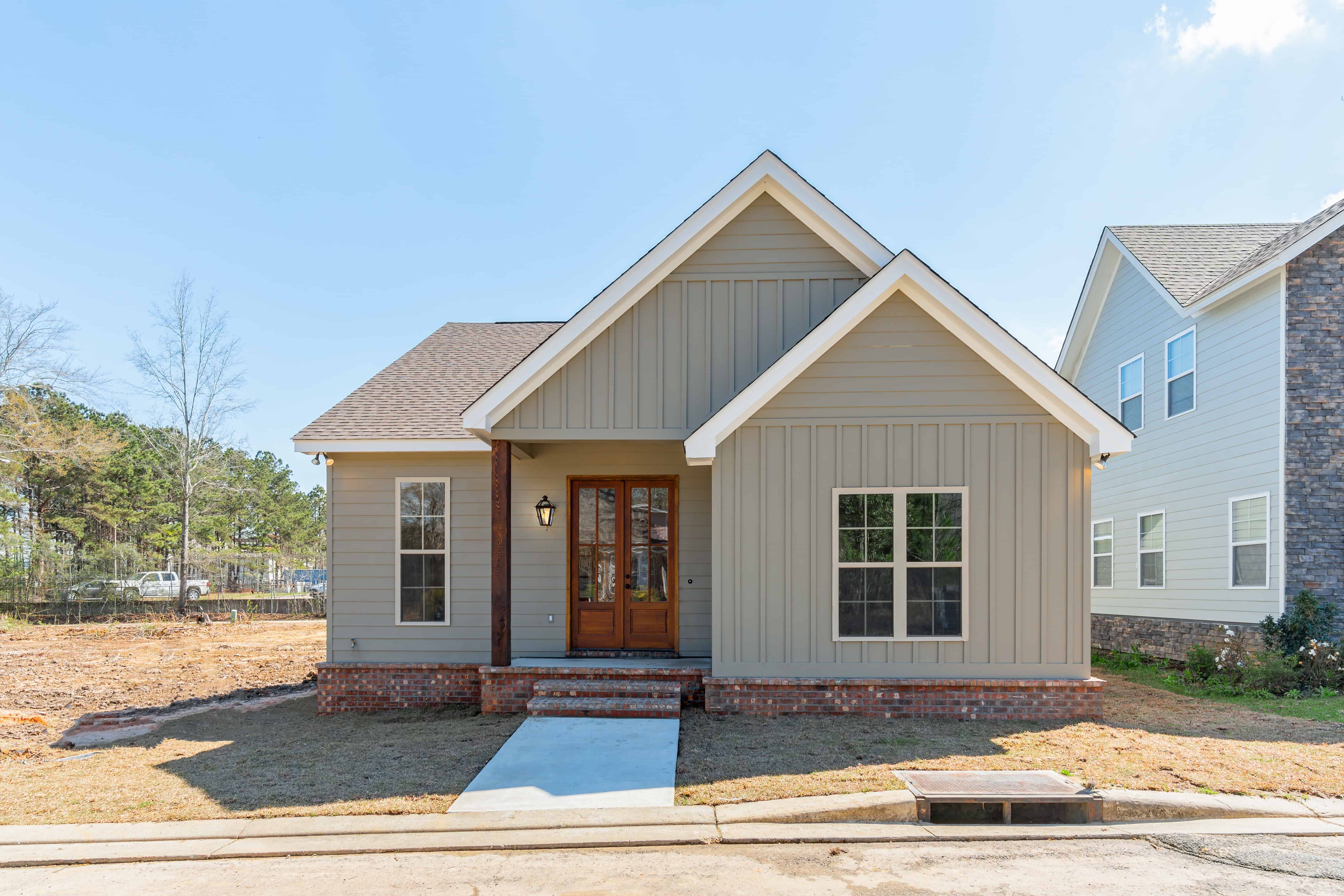 Home Plan Front Elevation of this 3-Bedroom,1450 Sq Ft Plan -142-1123