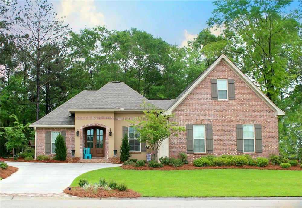 Color photograph of Acadian home (ThePlanCollection: House Plan #142-1155)
