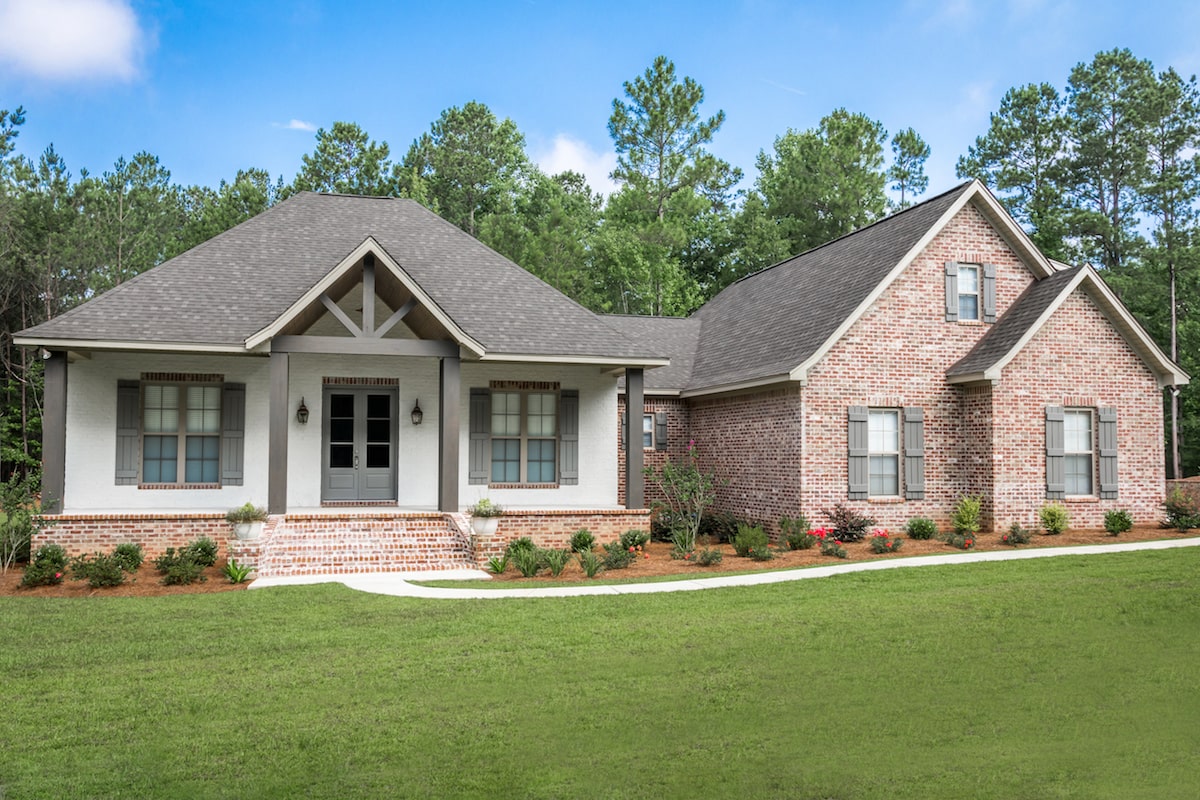 Front elevation of Acadian home (ThePlanCollection: House Plan #142-1197)