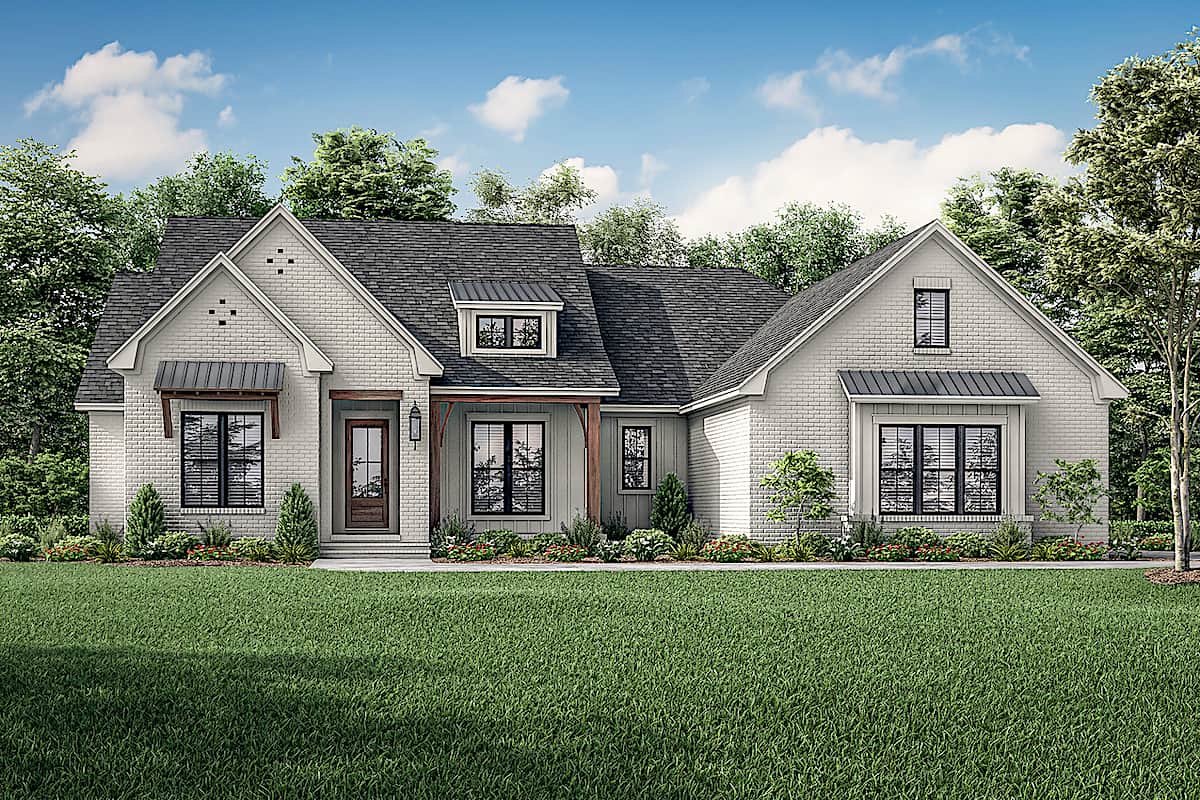 Front elevation of Acadian home (ThePlanCollection: House Plan #142-1235)