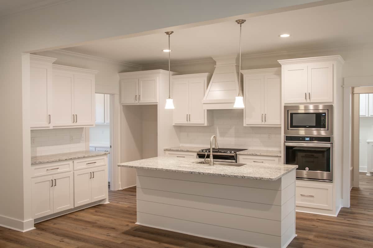 Kitchen: Kitchen Island of this 3-Bedroom,2002 Sq Ft Plan -142-1251