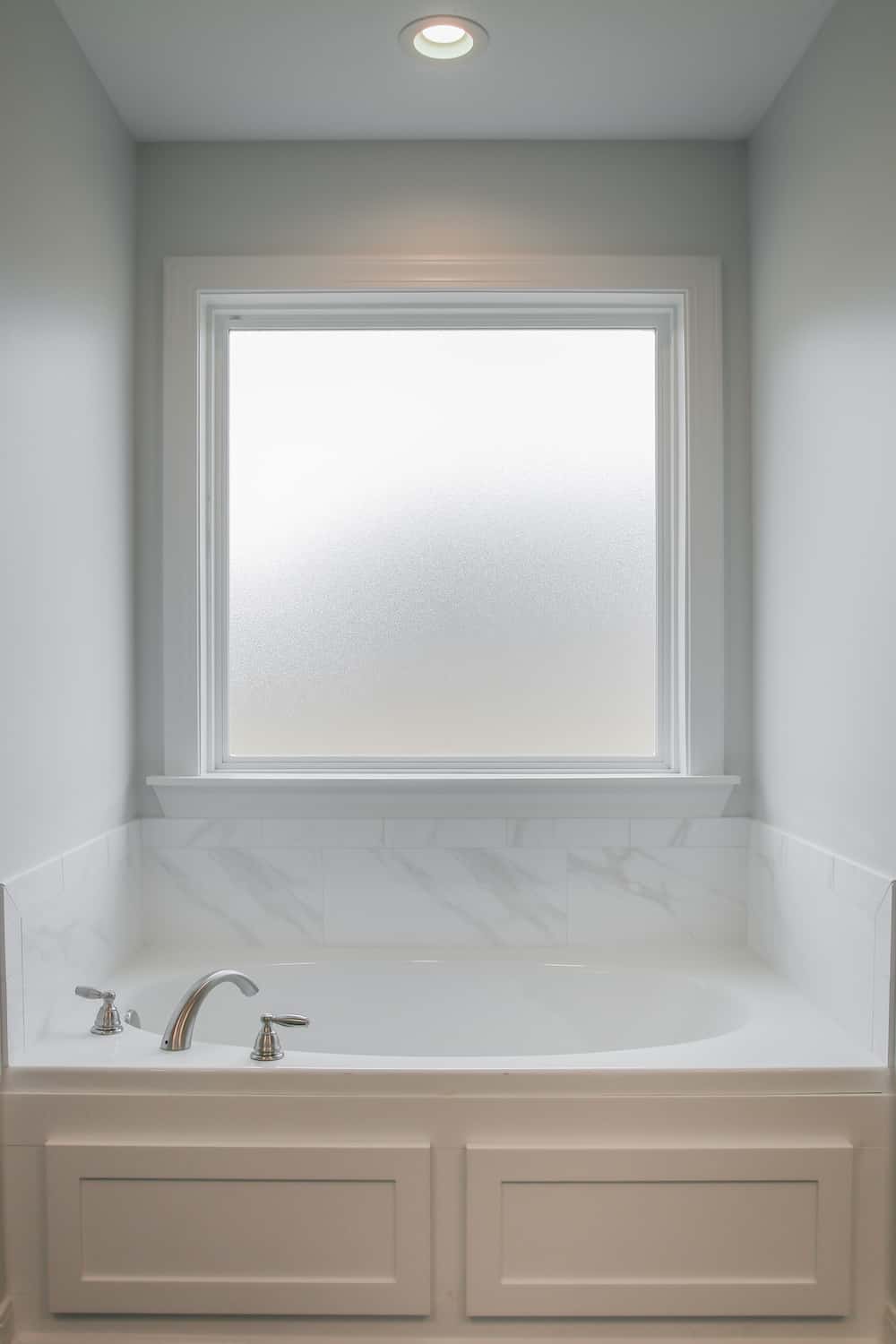 Master Bathroom: Tub of this 3-Bedroom,1459 Sq Ft Plan -142-1271
