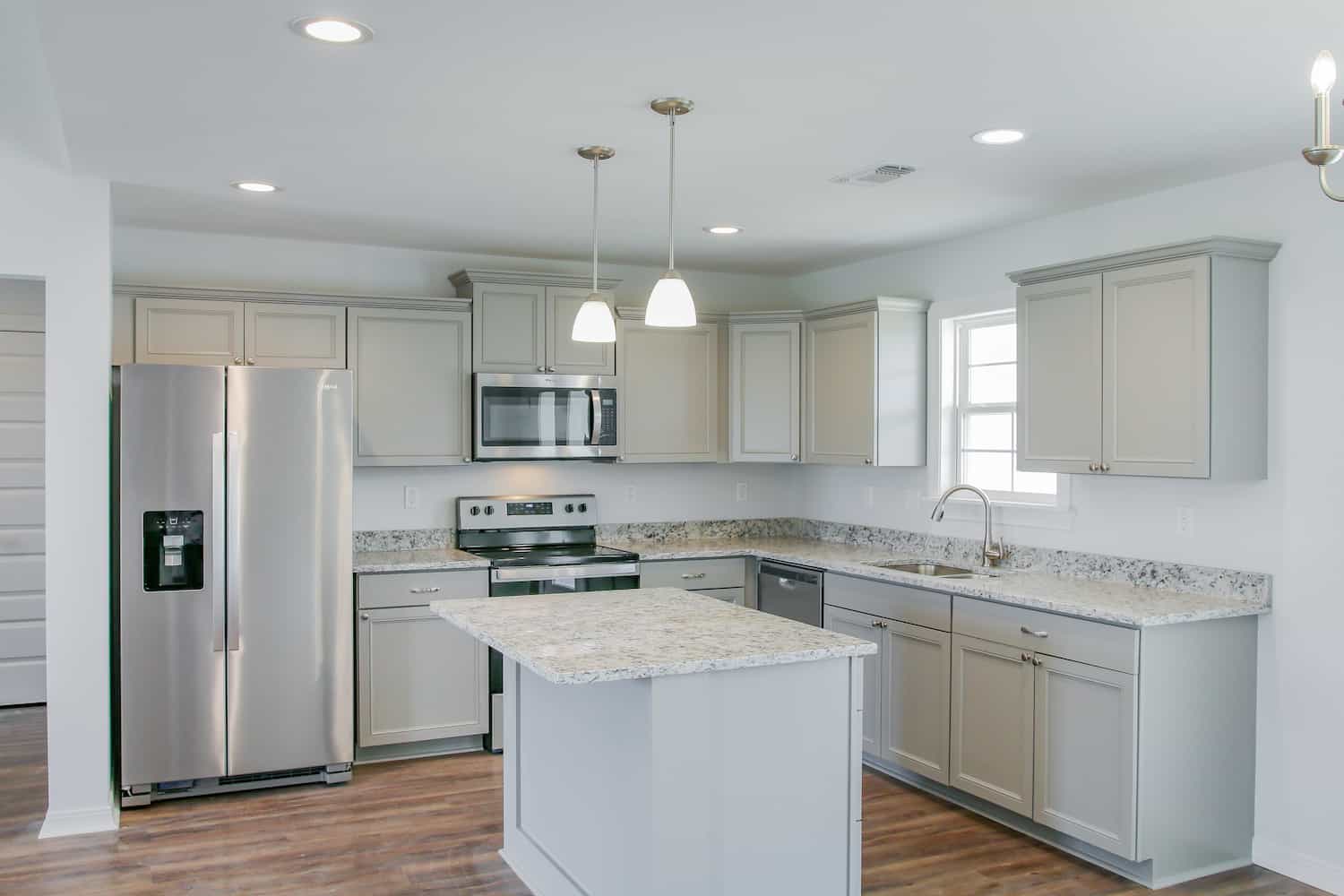 Kitchen: Breakfast Bar of this 3-Bedroom,1459 Sq Ft Plan -142-1271
