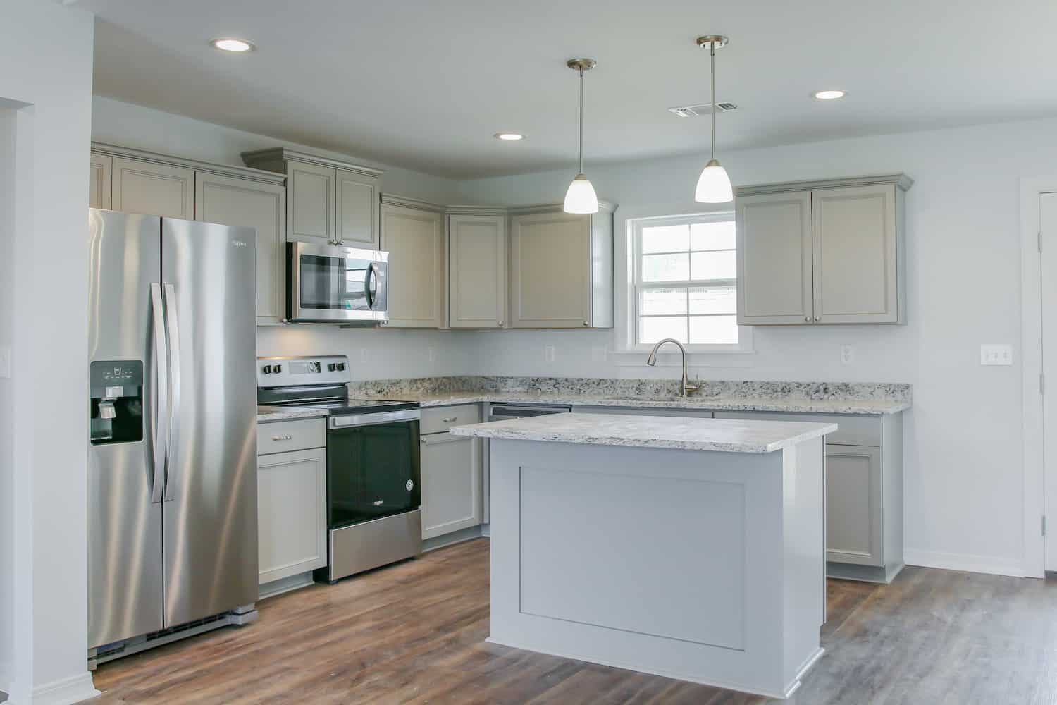 Kitchen: Kitchen Island of this 3-Bedroom,1459 Sq Ft Plan -142-1271