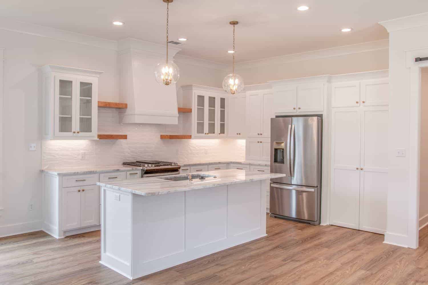 Kitchen: Kitchen Island of this 3-Bedroom,2388 Sq Ft Plan -142-1431