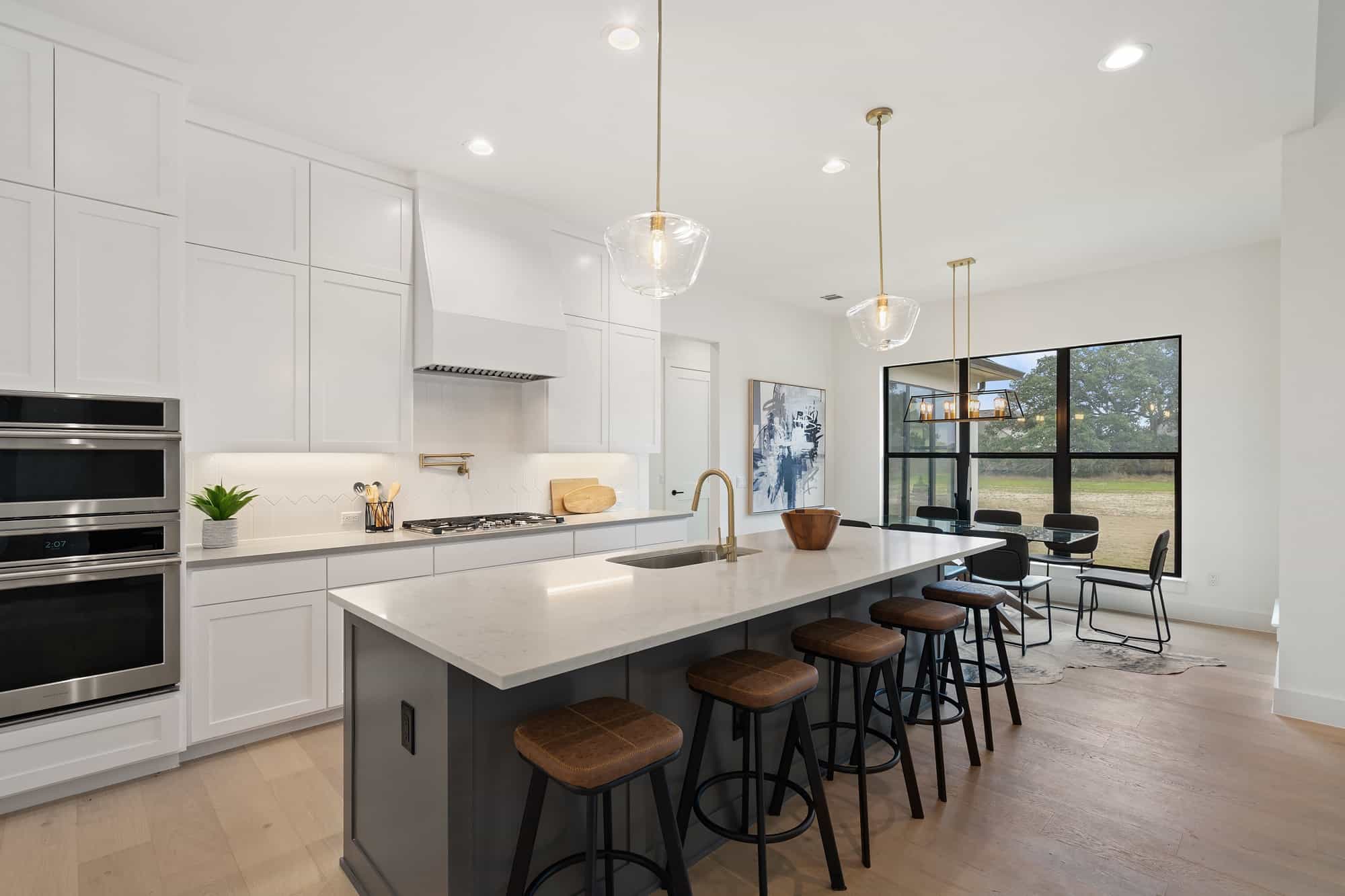 Kitchen: Breakfast Bar of this 5-Bedroom,3152 Sq Ft Plan -142-1440