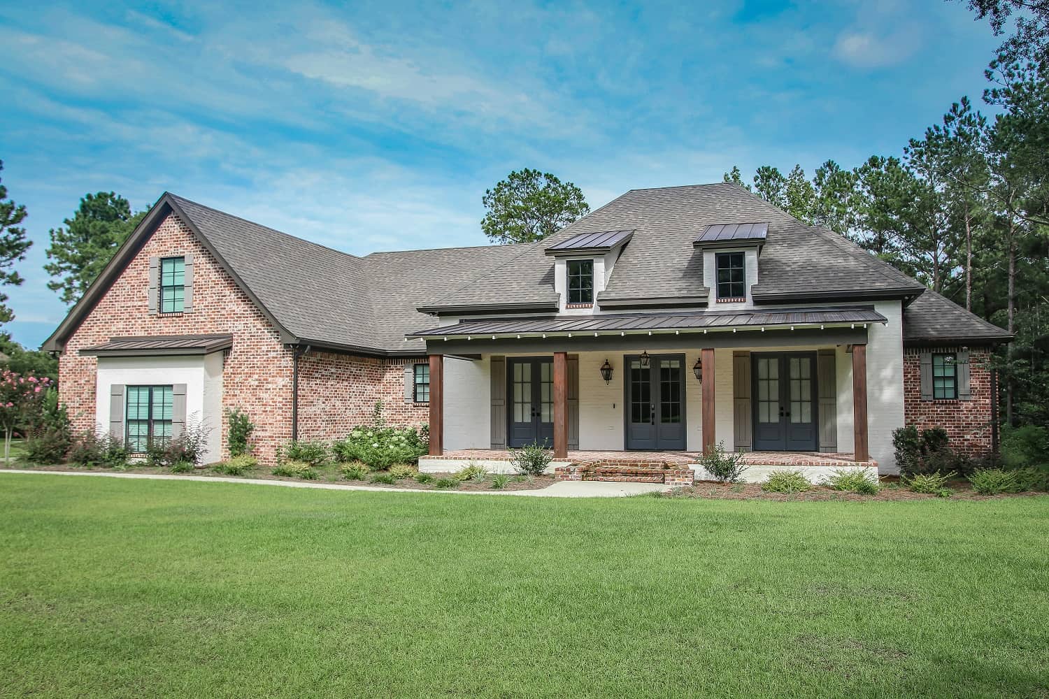 Front elevation of Ranch home (ThePlanCollection: House Plan #142-1446)