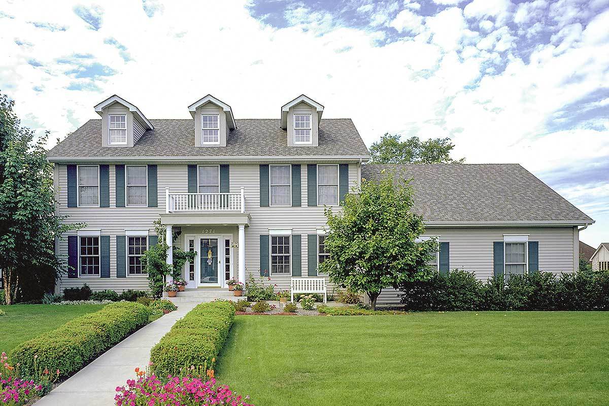 Front view of Colonial home (ThePlanCollection: House Plan #146-1263)