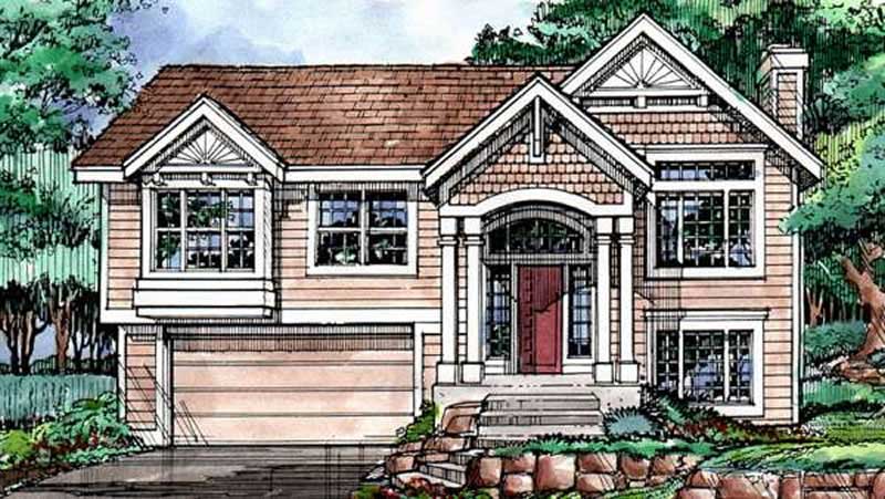 Front view of Multi-Level home (ThePlanCollection: House Plan #146-1329)