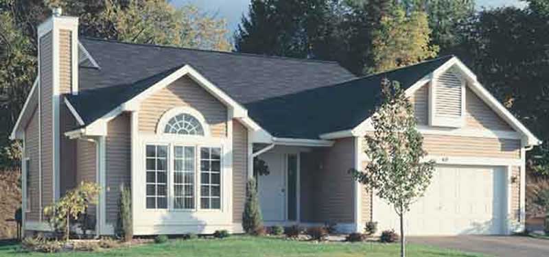Front view of Country home (ThePlanCollection: House Plan #146-1437)