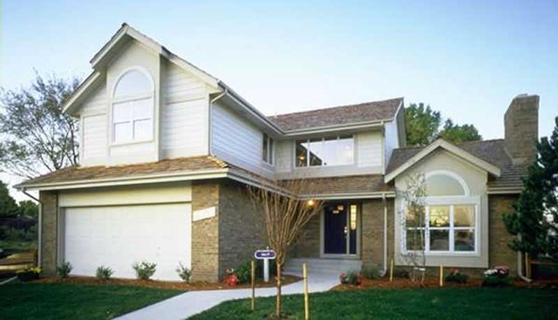 Front view of Contemporary home (ThePlanCollection: House Plan #146-1468)