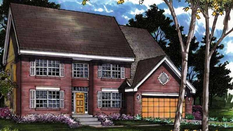 Front view of Colonial home (ThePlanCollection: House Plan #146-1595)