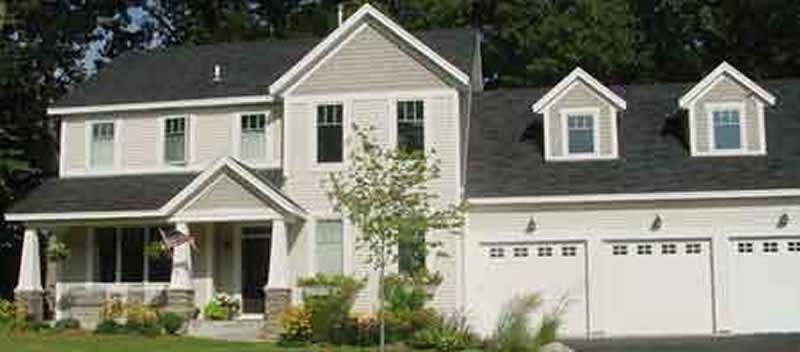 Front view of Country home (ThePlanCollection: House Plan #146-1928)