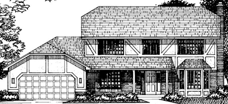 Front view of Tudor home (ThePlanCollection: House Plan #146-1964)